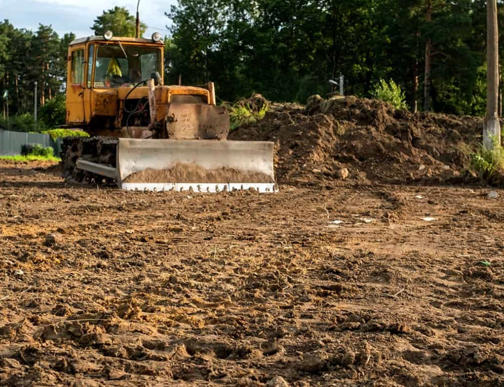 Bulldozer digging trench