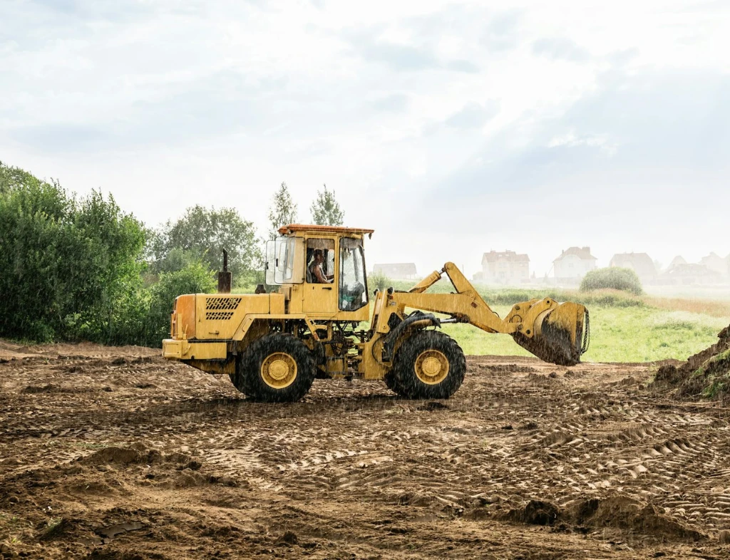 Bulldozer pushing soil